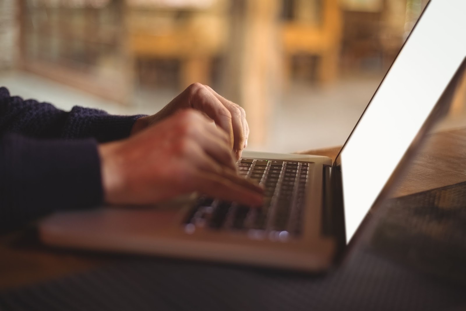 Close up of man using laptop