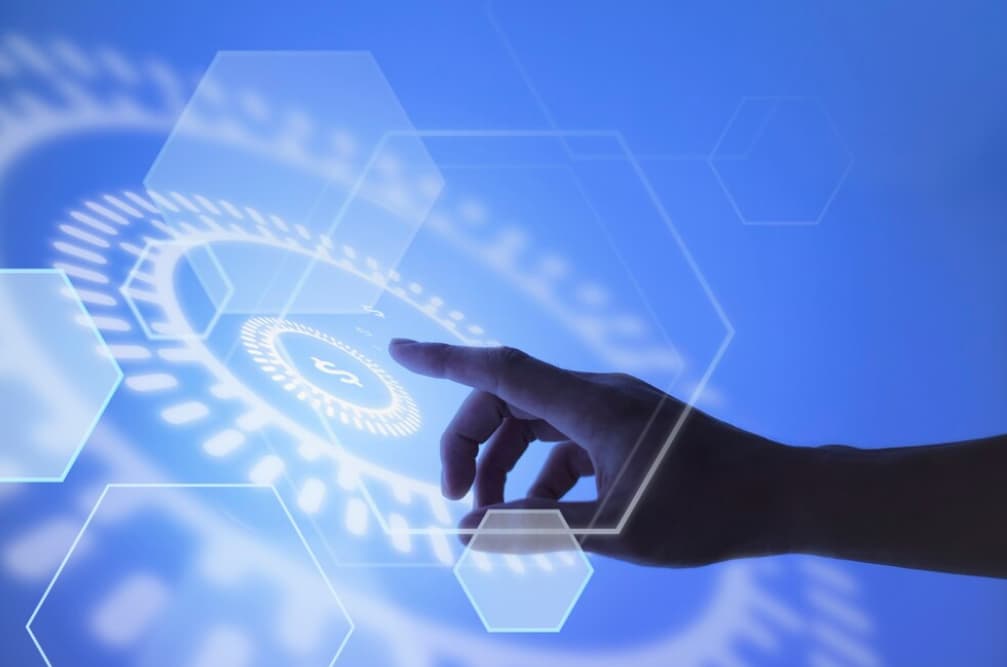 A hand interacting with digital blockchain graphics on a blue background